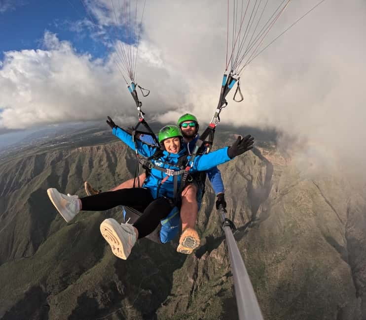 Costa Adeje, Paragliding with pick up service and 5 free photos! - Landing near the coast and returning to your hotel