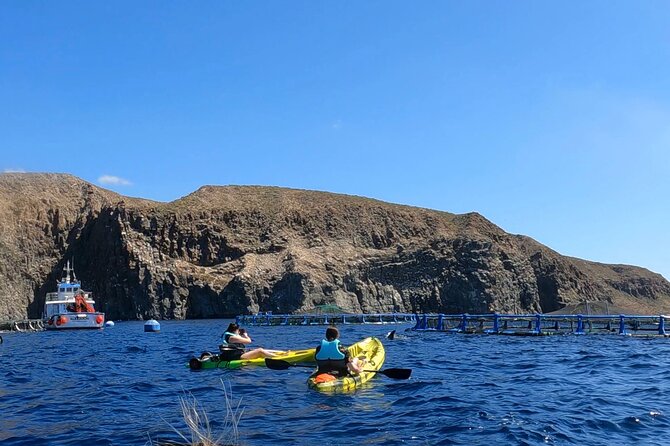 Guided Kayak Tour From Los Cristianos Beach Tenerife - Photos, safety, and the guide team