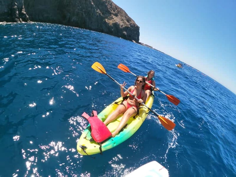 Los Cristianos: Kayak and Snorkel with Turtles and Photos - Paddling beneath Tenerife’s black volcanic cliffs