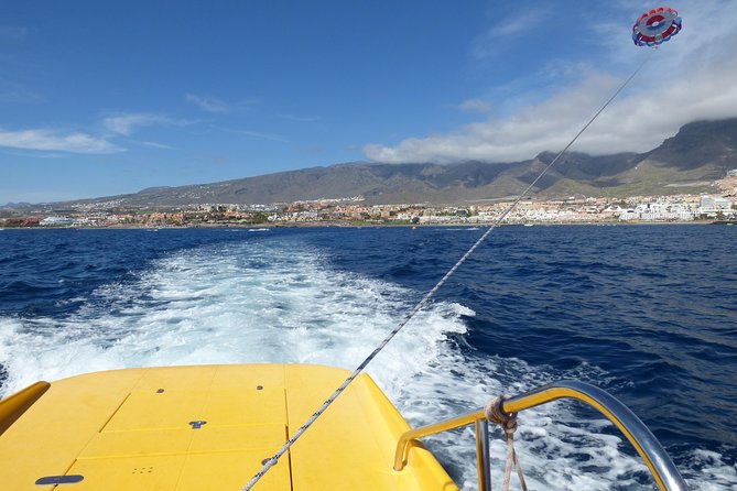 Parascending Tenerife. Stroll above the south Tenerife sea - The optional splash before landing