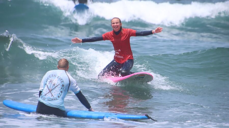 Playa de Las Americas: Surfing Group Lesson with equipment - Returning to the surf center