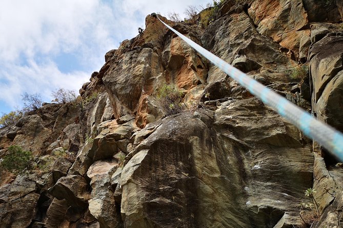 Rock climbing in natural space. - A small climbing class, not a crowded group outing