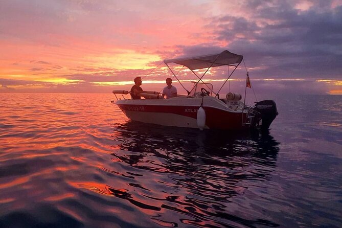Self Drive Boat Rental in Costa Adeje Tenerife - Taking the helm from Costa Adeje