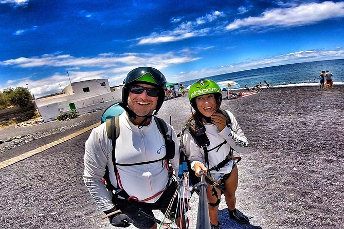 SILVER 1000m paragliding tandem flight above South Tenerife - Harness, helmet, and a short safety briefing