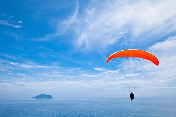 Tandem Paragliding Flight over Tenerife - The mountain setting and the changing view below