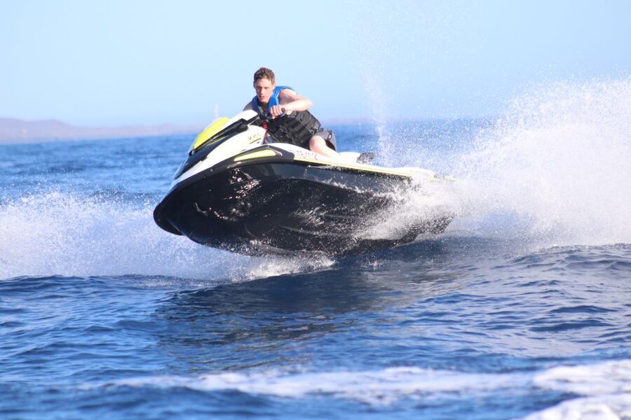 Tenerife: Jet Ski Guided Tour with Optional Photo Service - The swimming stop breaks up the speed