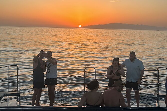 Tenerife Sunset Catamaran tour with transfer - Food and Drinks included. - Hotel transfers across south Tenerife